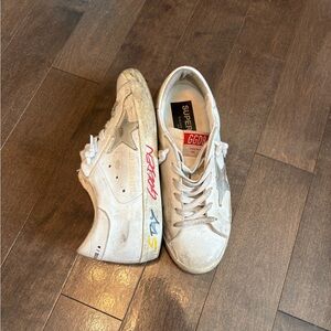 Golden Goose Cream Sneakers with Star and Red Accents